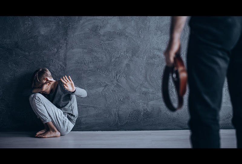 Punishing father. Father Punishing his son with a Belt.