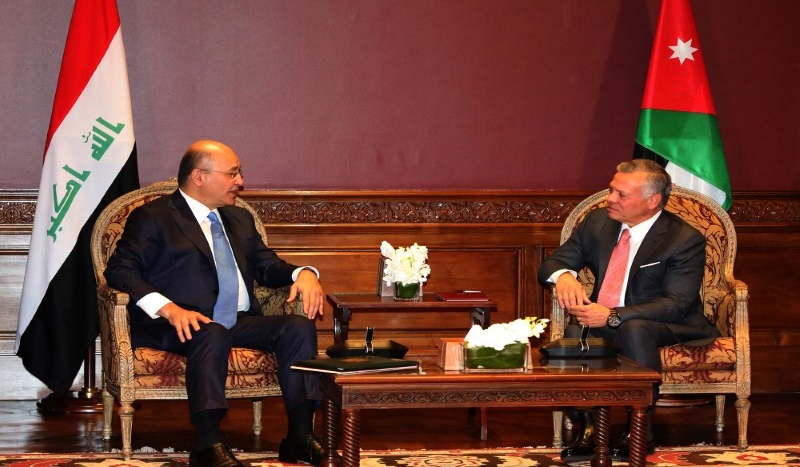 الملك والرئيس العراقي يتفقان على توسيع التعاون الاقتصادي بين البلدين