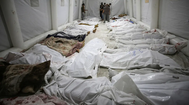 يوم دامٍ في غزة ..  مستشفى الأهلي يفيض بالجثث