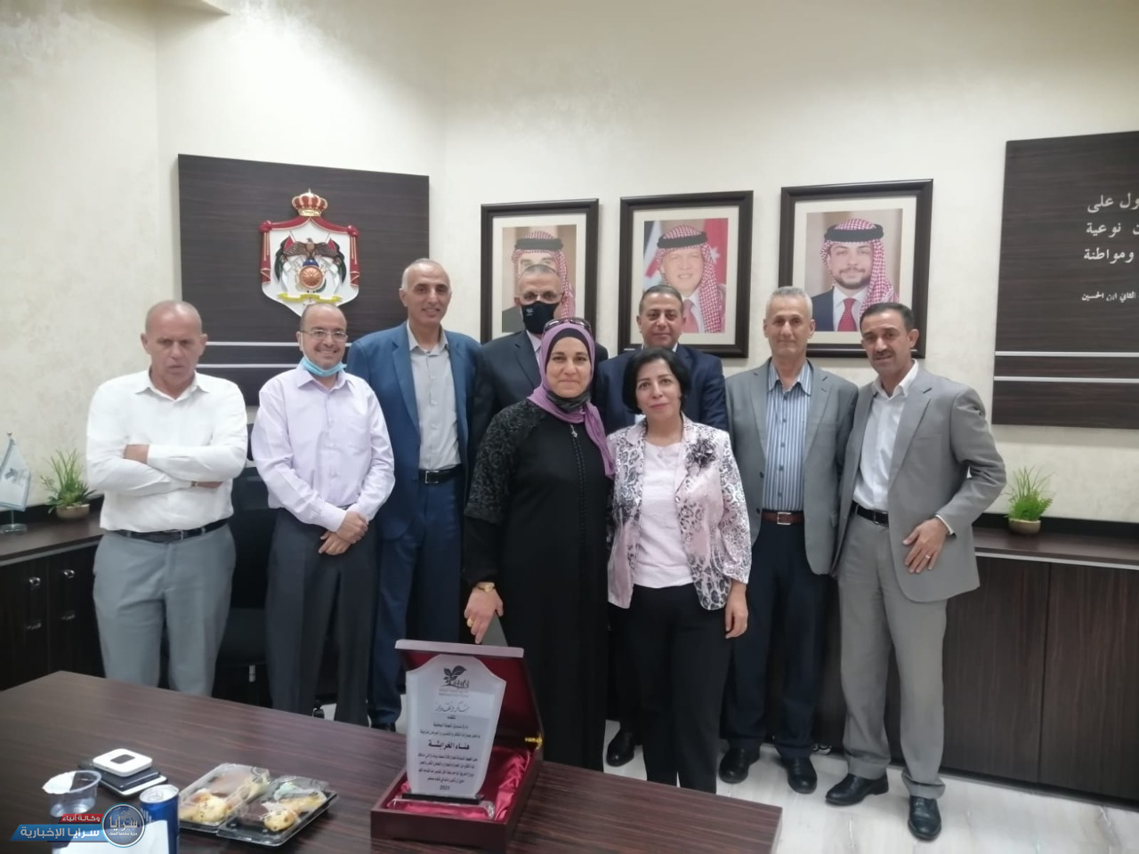 صندوق المعونة الوطنية يكرم الموظفة هناء الخرابشة 