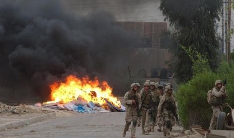 صور جديدة لجنود أميركيين يحرقون جثث عراقيين
