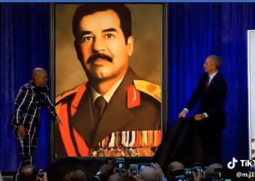 بالفيديو  ..  قصة الفيديو الذي ظهر فيه الرئيس الامريكي السابق اوباما وهو يزيح الستار عن لوحة لصدام حسين 