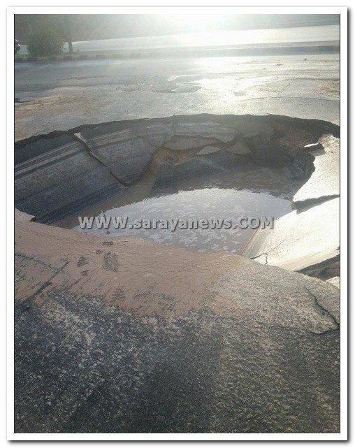 بالصور  ..  انفجار خط للمياه يتسبب بحفرة كبيره تعيق حركة السير في عمان