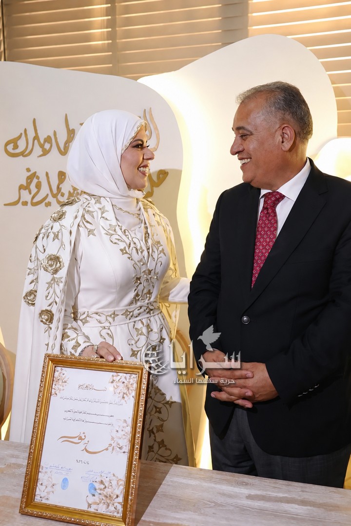النائبان أحمد الهميسات ونور أبو غوش يحتفلان بكتب كتابهما ..  صورة