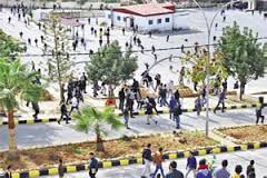 مشاجرة جماعية في جامعة الزرقاء الخاصة  بسبب شعار "رابعة" 