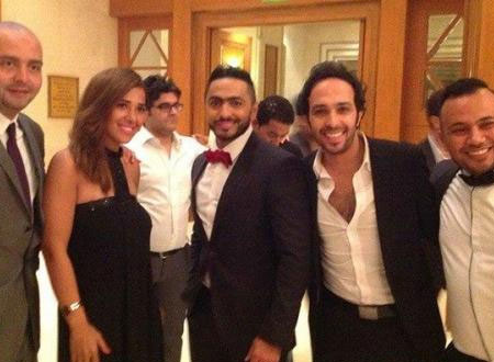 بالصور ..  تامر حسني وزوجته بسمة بوسيل في حفل زفاف خاص