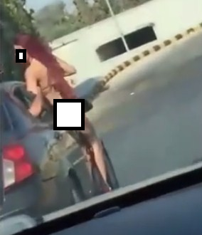 بالصور ..  فتاة عارية على طريق المطار في عمان  والامن يبحث عنها
