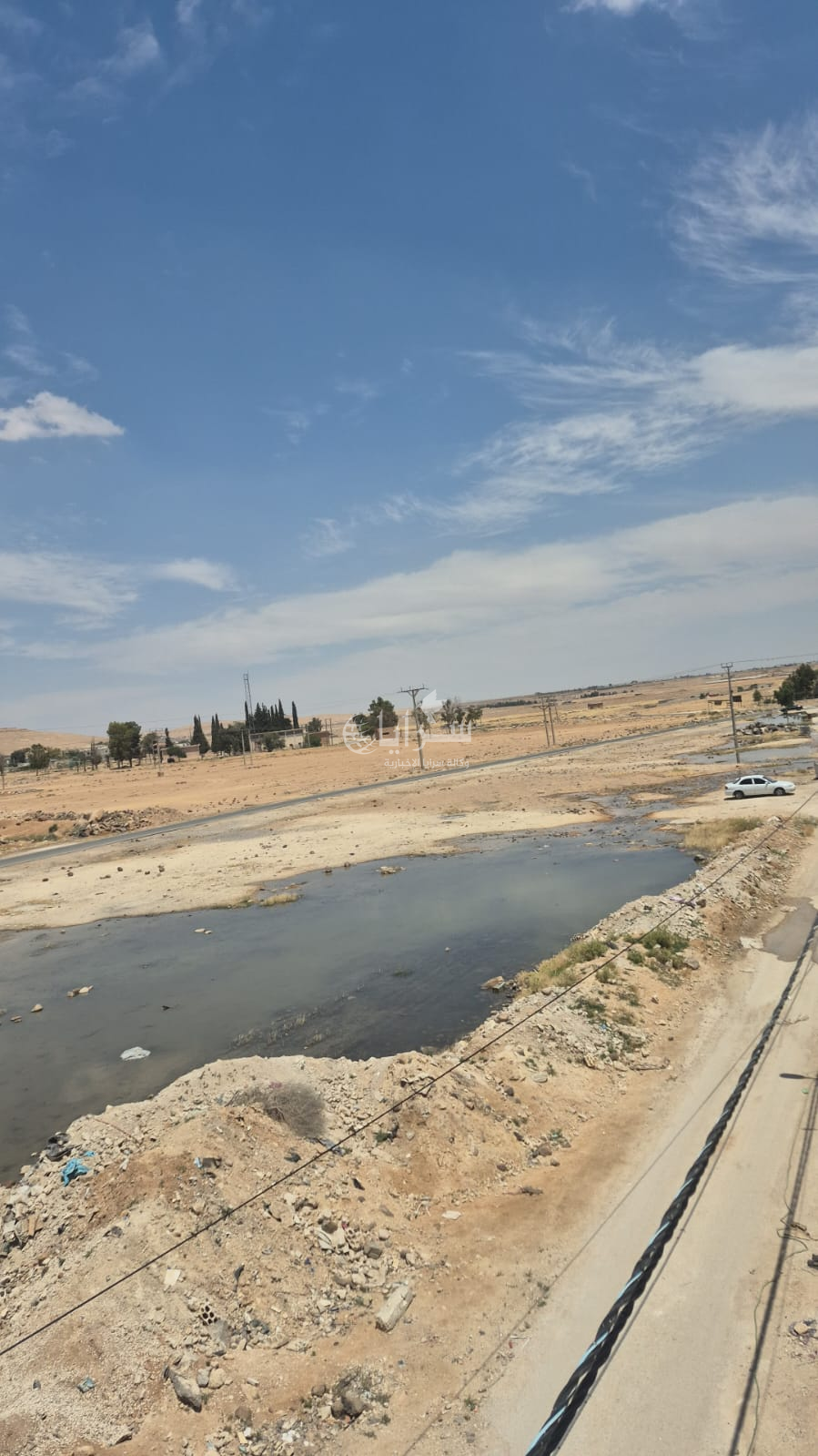 تدفق المياه من "بئر" يحوّل حي عمر في الخالدية إلى مكرهة صحية  ..  صور 