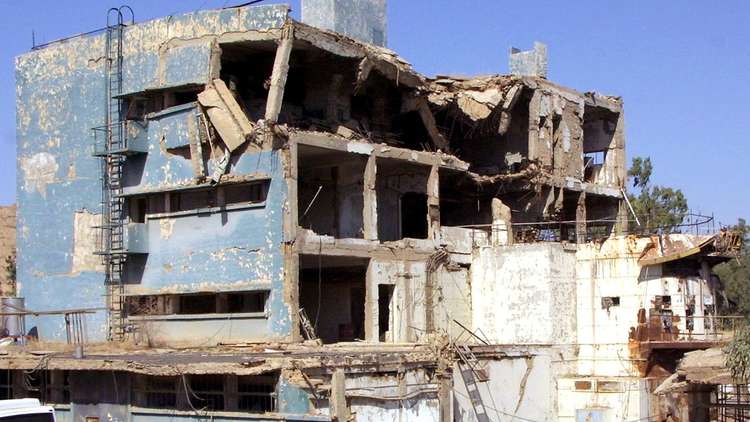 19 شخصا محاصرون تحت أنقاض بناية انهارت وسط بغداد