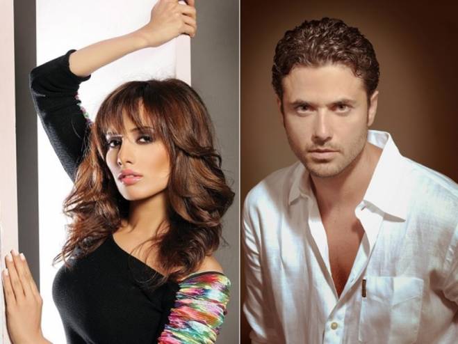 اراد منع طفليه من السفر ..  زينة ترد على أحمد عز