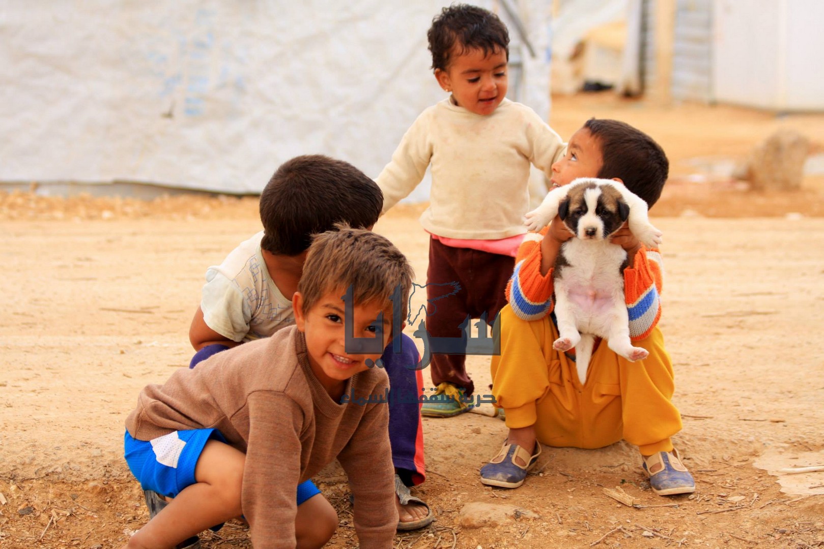 بالصور  ..  شاهد كيف تبدو الحياة بمخيم "الزعتري" بعد (4) اعوام من الأزمة السورية