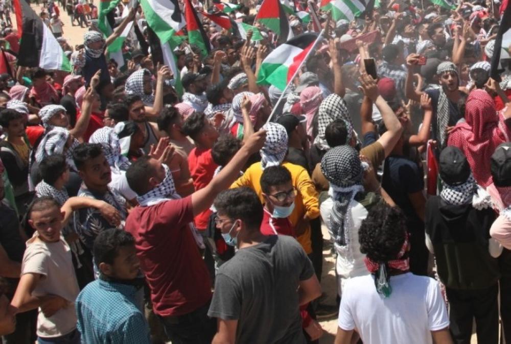 إربد: وقفة شبابية تضامنا مع القدس وغزة