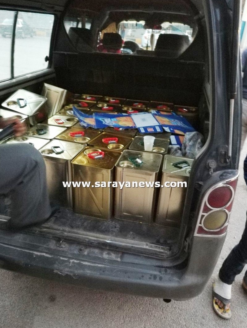 بالصور  ..  الغذاء و الدواء تضبط (111) تنكة زيت زيتون مغشوش في اربد