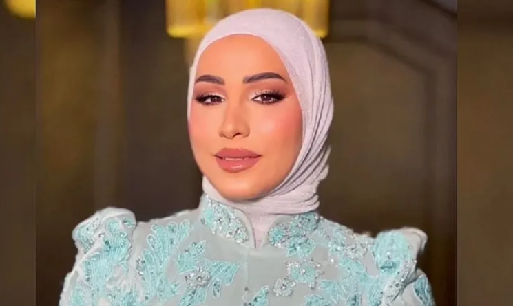 نداء شرارة تحسم حقيقة خطوبتها بفستان أبيض وبوكيه ورد