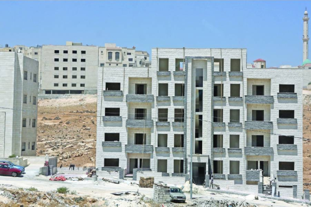 عقاريون يطالبون بتخفيض ضريبة المبيعات على المواد الانشائية