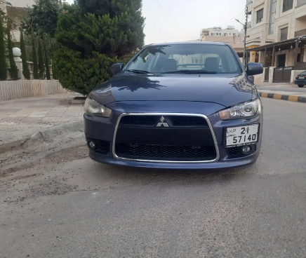  ميتسوبيشي لانسر EX فراشه موديل 2011 لون كحلي ماتور 2000CC مواصفات ال GT بحالة الوكاله