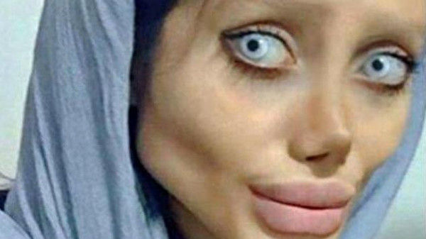 شبيهة أنجلينا جولي أخطأت الطريق ..  وهذه هي النتيجة .. صور
