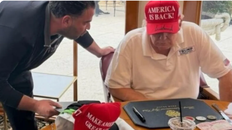 عملة مع صورة صدام أمام ترمب تشغل العراقيين ..  ما القصة؟