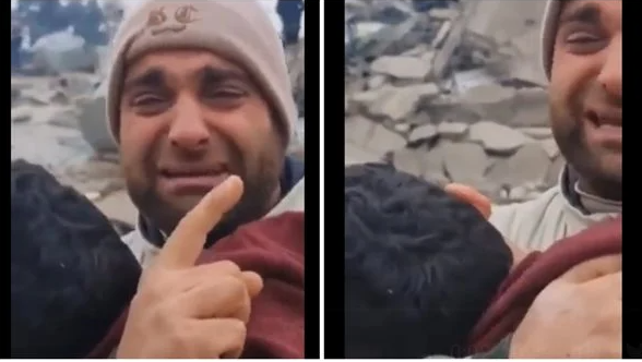 فقد 12 من عائلته في الزلزال ..  سوري يبكي بحرقة وطفل بين يديه - فيديو