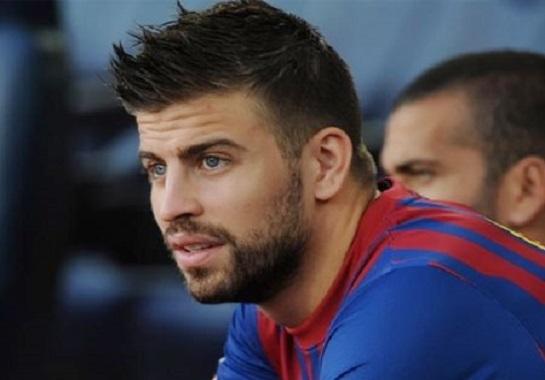 بيكيه يجدد عقده مع برشلونة حتى 2019