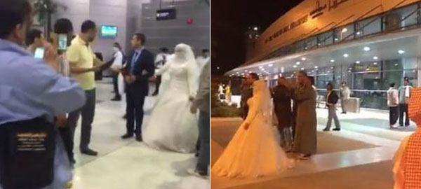 بالفيديو : عريس مصري يستقبل عروسه بفستان الزفاف في مطار ينبع