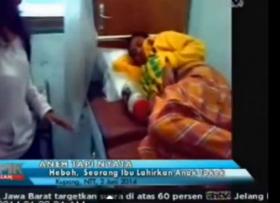 بالفيديو  ..   ..   امرأة تنجب "سحلية" و السلطات الرسمية تفتح تحقيقا بالحادثة !
