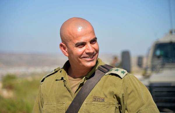 قائد محرقة الشجاعية غسان عليان يعود من المستشفى الى الحرب على حدود غزة مباشرة