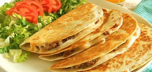  بالفيديو  ..  طريقة تحضير صفيحة اللحم بخبز التورتيلا