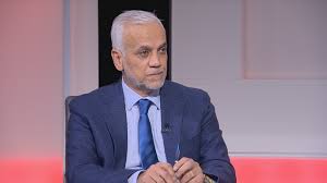 متسولة تطلب من وزير التنمية نقوداً بالشارع 