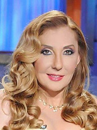 شاهد  ..  نادية الجندي بصورة نادرة  ..  وجمالها الطبيعي محط الأنظار