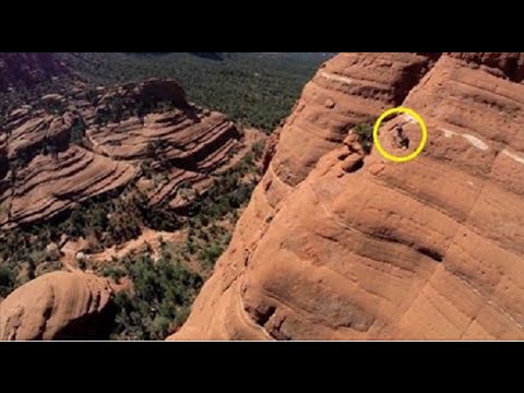 بالفيديو  ..  مغامر مجنون يقود دراجته بأعالى منحدرات جبال الأريزونا