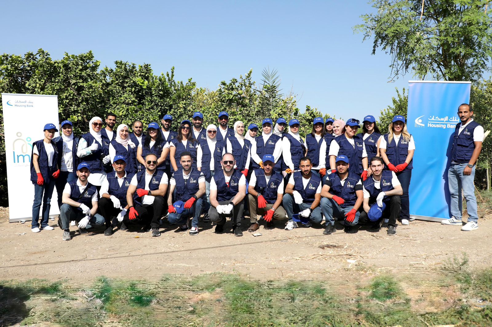 فريق "إمكان الإسكان" يشارك في جني محاصيل أشجار مثمرة بالتعاون مع الجمعية العربية لحماية الطبيعة