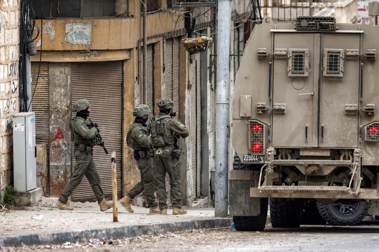 إصابة 6 فلسطينيين في كفر مالك برصاص مستوطنين