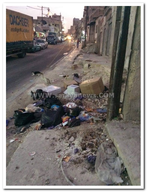 بالصور .. النفايات تتراكم في سوق المحطه فاين انت يا امين عمان 