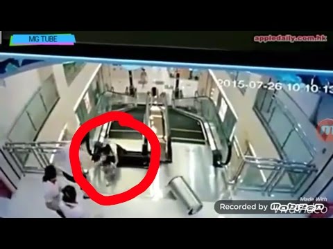 فيديو مؤلم  ..  سلم كهربائي متحرك "يبتلع" سيدة ..  فتنقذ رضيعها قبل موتها +18