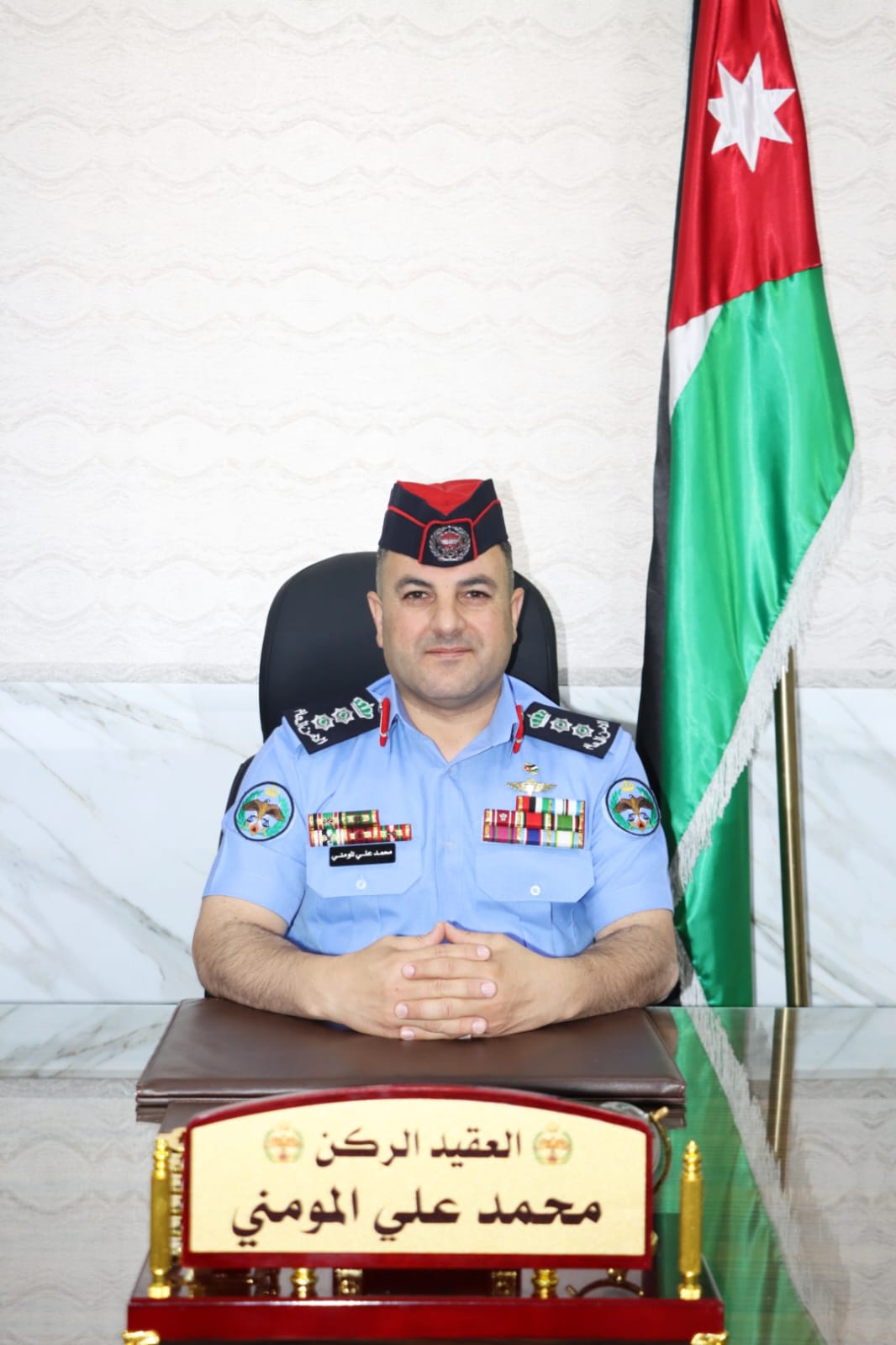 محمد علي المومني مبارك الترفيع لرتبة عقيد