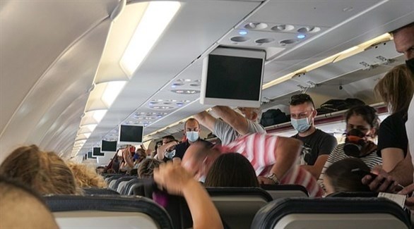 صعود الركاب من الخلف للأمام على الطائرة يزيد احتمال تعرضهم لكورونا