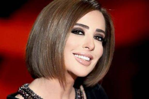 شاهد  ..  صور صادمة لوفاء الكيلاني قبل عمليات التجميل