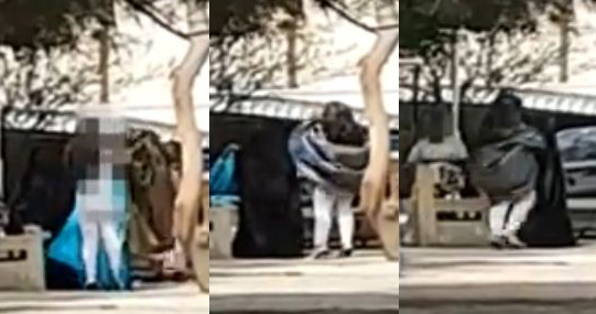 بالفيديو ..  عارضة أزياء تبدل ملابسها في حديقة عامة بالكويت