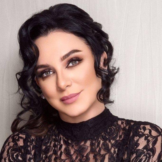  صور : سلاف فواخرجي ووائل رمضان يحتفلان بابنهما الدكتور حمزة