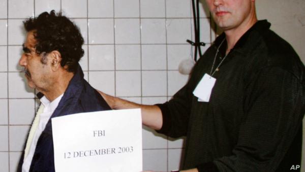 وفاة عميل "FBI" الذي قبض على صدام حسين