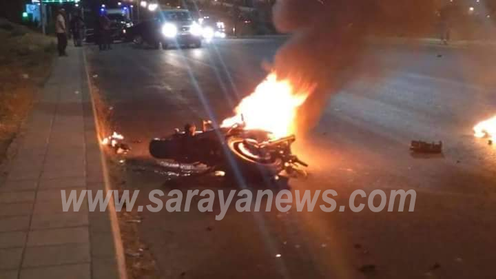  بالصور  ..  وفاة سائق دراجة بحادث مروع على طريق المطار 