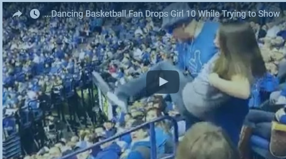 بالفيديو: لحظة سقوط طفلة من بين يدي أحد المشجعين