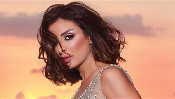 بالفيديو ..  أنغام تُبهر الجمهور بإطلالتها في برومو أغنية "بحبك وبرتحلك"