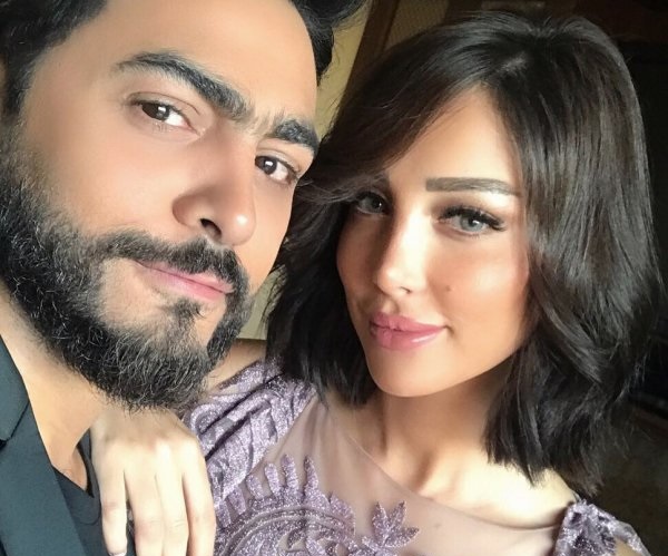 بالصور  ..  كيف احتفلت بسمة بوسيل بعيد ميلاد زوجها تامر حسني  