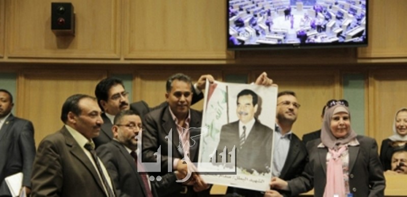 حكومة النسور تمتنع عن قراءة الفاتحة عن روح صدام حسين والنواب يرفعون صوره