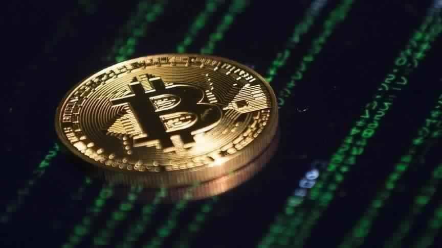 "بيتكوين" قرب أعلى مستوى تاريخي وسط إقبال على المخاطرة