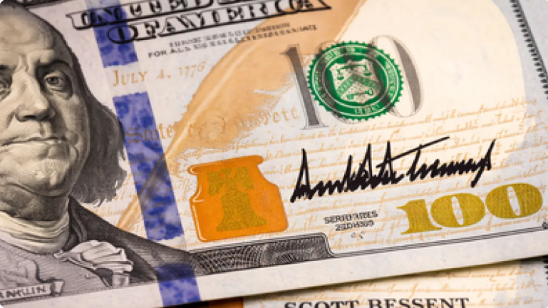 لأول مرة ..  توقيع رئيس أمريكي يظهر على الدولار