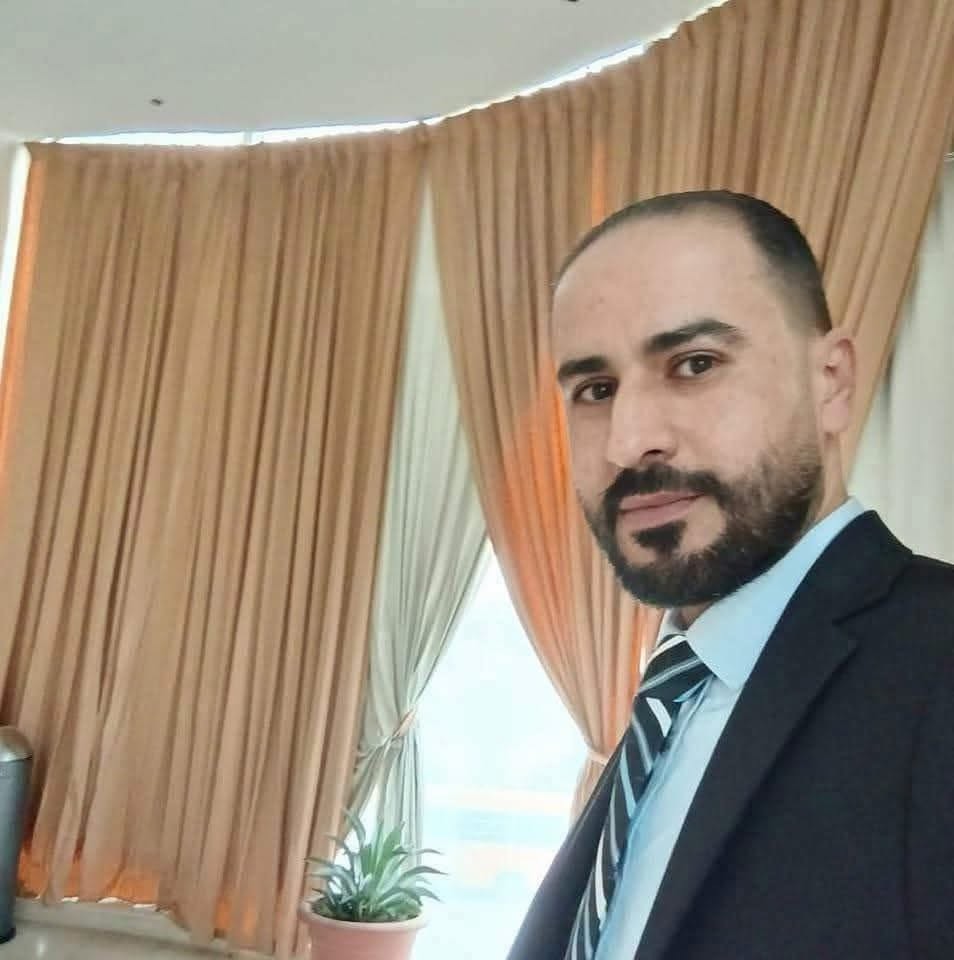 كوادر مستشفى الأمير حمزة تودّع الصيدلاني والممرض د. محمد الجمزاوي