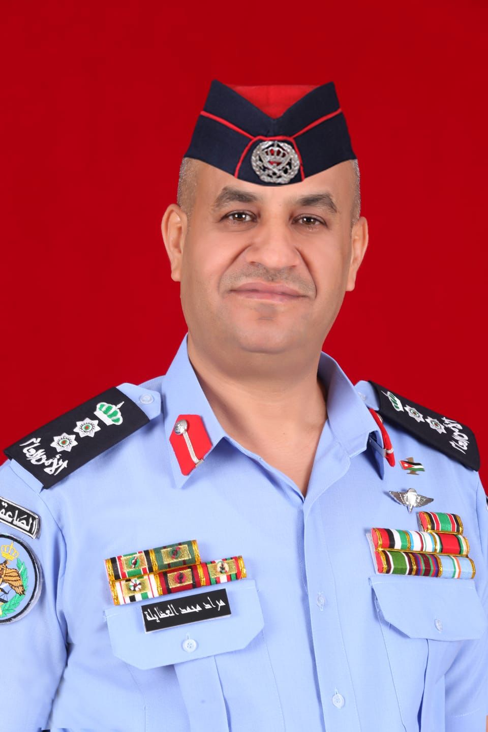 راشد القرالة يهنئ العقيد مراد محمد عبدالعزيز العضايلة